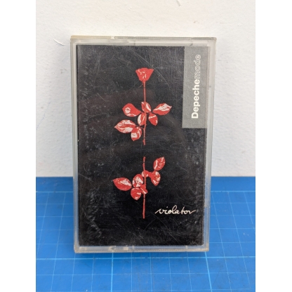 Depeche Mode Violator Cassette Tape. Immerse yourself in the iconic sounds of Depeche Mode with this used cassette tape