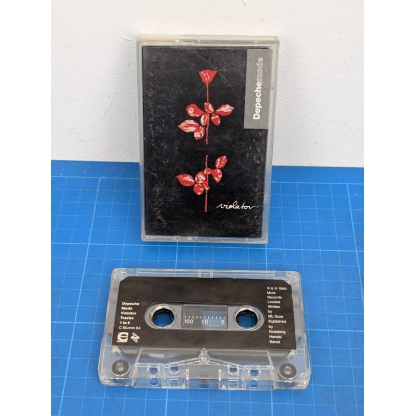 Depeche Mode Violator Cassette Tape. Immerse yourself in the iconic sounds of Depeche Mode with this used cassette tape