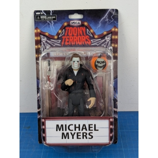NECA Toony Terrors Michael Myers Action Figure. He's come home! Bring the boogeyman to your collection with the NECA Toony Terrors Michael Myers action figure.