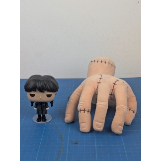 Wednesday Addams Funko Pop! #1274 & Thing Plush Bundle. Creepy and kooky, mysterious and spooky! Bring home a piece of the Addams Family
