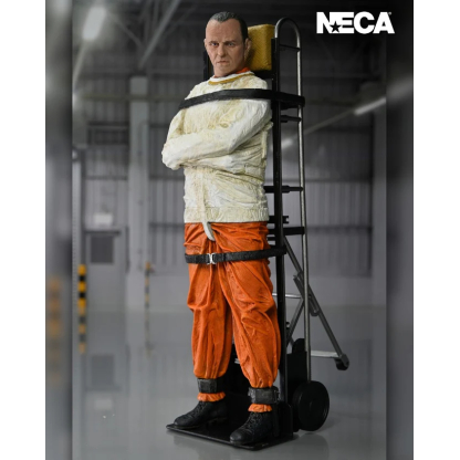 Dressed in his striking orange prison uniform and straightjacket, this highly detailed figure features full articulation for dynamic posing.