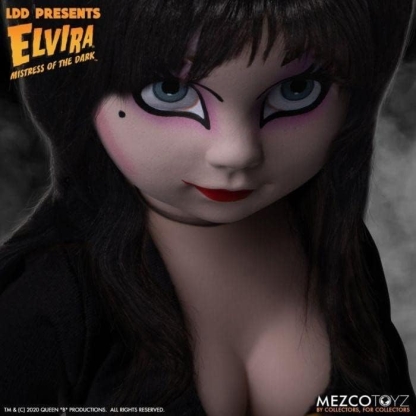 elvira living dead doll photographed from varied angles with spooky background