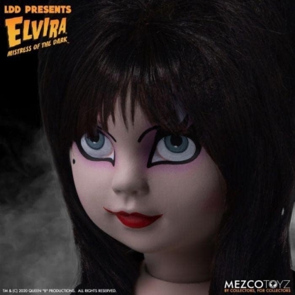 elvira living dead doll photographed from varied angles with spooky background