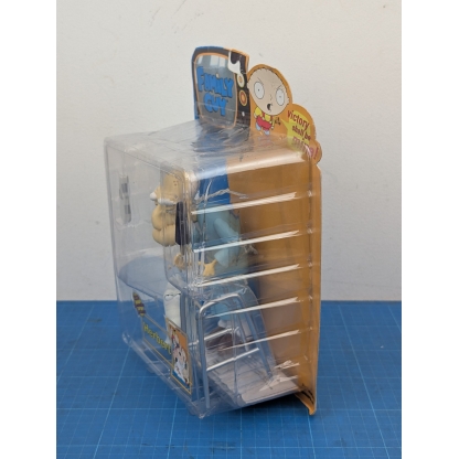 "Right side view of a boxed Mezco Family Guy Herbert action figure, showing the figure's profile through the clear plastic."