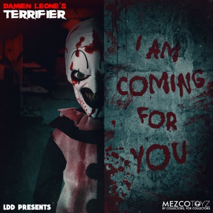 A split image featuring the Living Dead Doll of Art the Clown on the left, showing half his face with a chilling grin and green eyes. The right side is a dark, blood-stained wall with "I AM COMING FOR YOU" written in red, dripping letters.