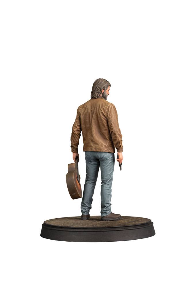 The Last of Us Part II Joel 9-inch PVC statue holding guitar and weapon.
