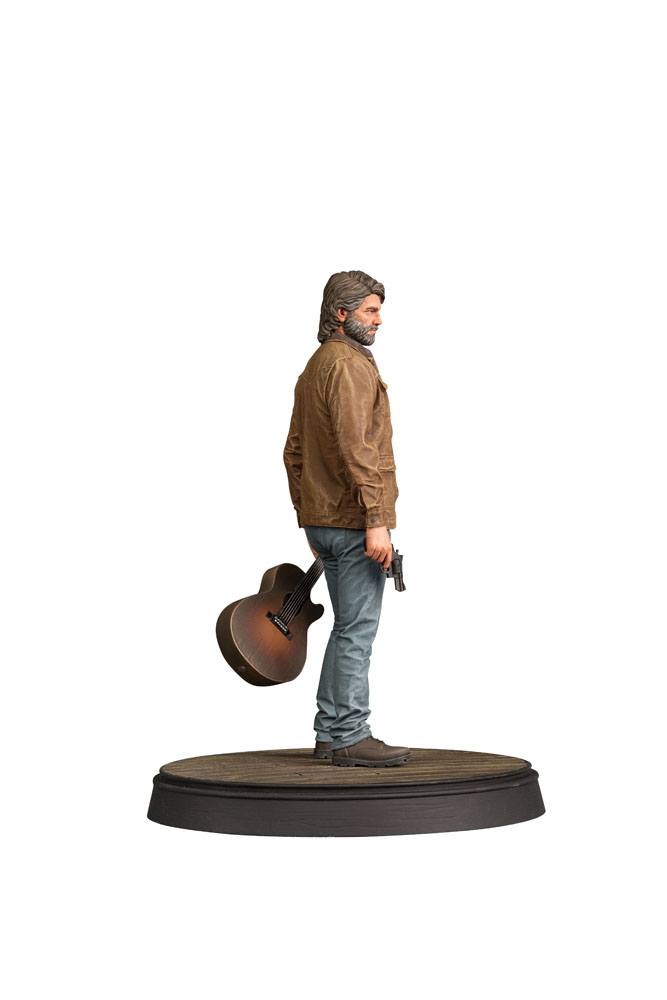 The Last of Us Part II Joel 9-inch PVC statue holding guitar and weapon.