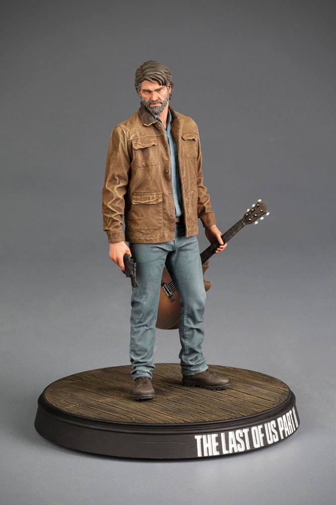 The Last of Us Part II Joel 9-inch PVC statue holding guitar and weapon.