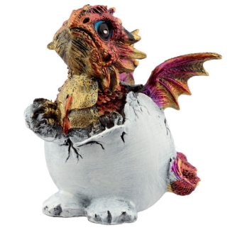 A detailed polyresin figurine of a small red dragon breaking out of a cracked, bone-colored eggshell