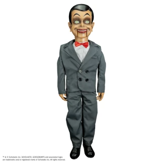 A life-size, 25-inch tall Slappy the ventriloquist dummy wearing his grey suit and red bow tie, standing in a menacing pose