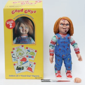The Maniac Chucky action figure with a blood-splattered face standing next to its opened yellow Good Guy Blind Box Series 2 packaging