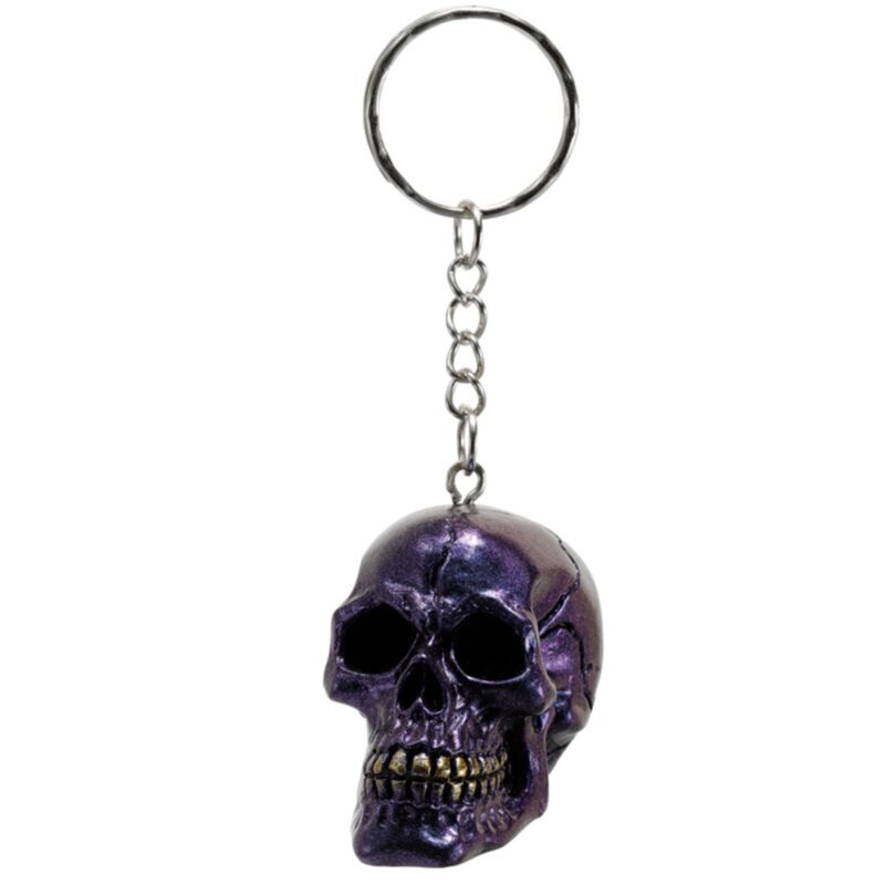 A detailed polyresin skull keyring finished in a vibrant metallic blue, heavily accented with gold paint along the teeth