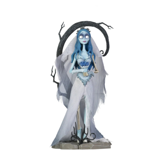 A highly detailed vinyl figurine of Emily from Tim Burton's Corpse Bride standing in a tattered wedding dress on a cobblestone display base with a tiny skeleton dog