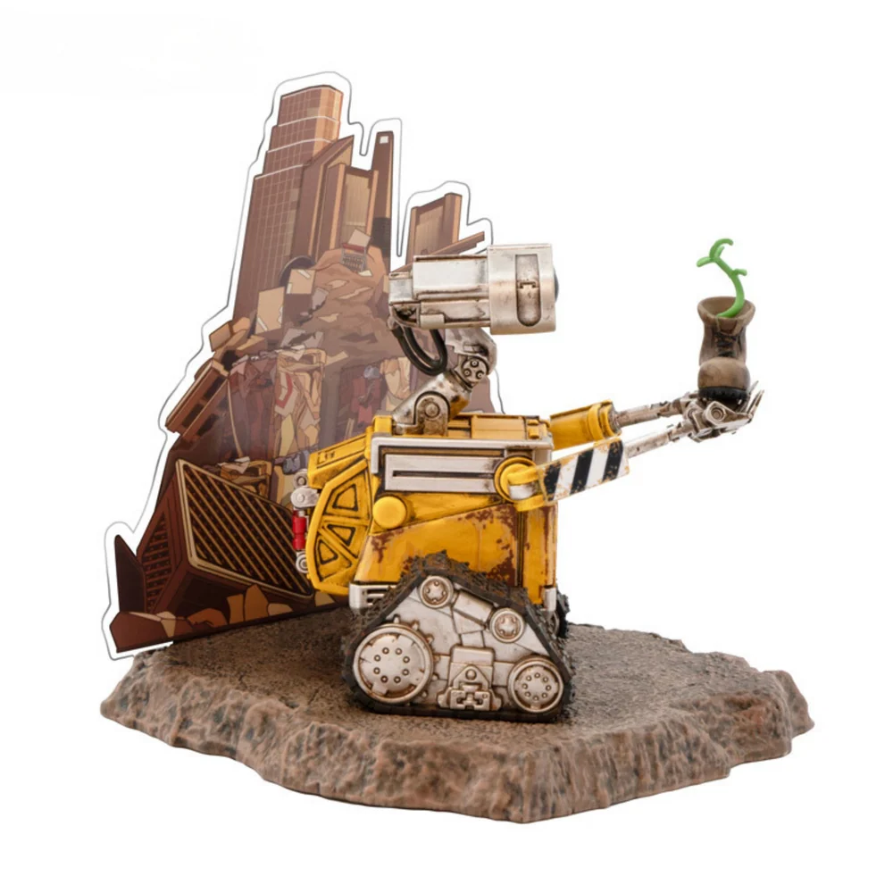 A highly detailed vinyl figurine of Disney Pixar's Wall-E standing on a small trash-heap themed display base, featuring weathered rust details and large expressive eyes